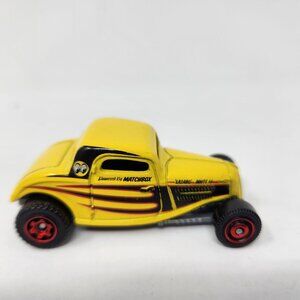 Matchbox 1933 Ford Coupe Die-Cast Model Car Yellow With Black & Red Flame Design